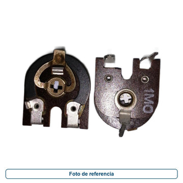 Foto de referencia de un preset visto por ambos lados, con ajuste central y terminales metálicas